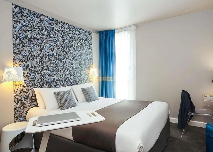 호텔 Mercure Batignolles - & 르망